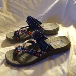 Ladies skecherssandals by outdoor lifestyle. Brand new never worn. Size 9 1/2